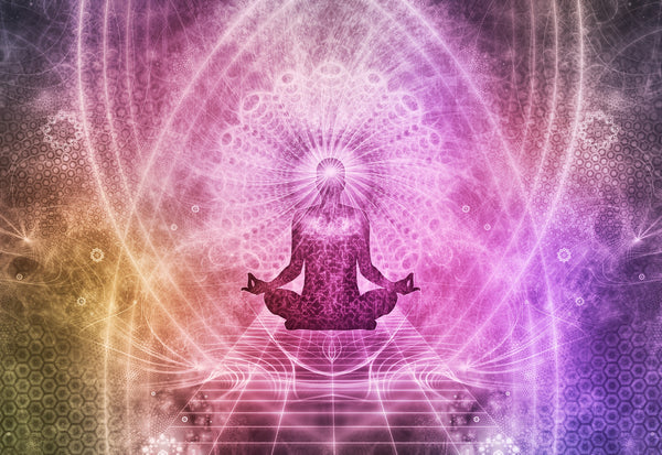 Ayurvedic chakras surrounding an abstract man doing yoga